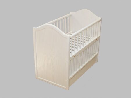 Wooden crib with white color